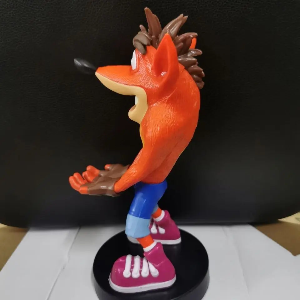 NECA Game Crash Bandicoot Figure Sane Trilogy Peripherals First 4 Gamepad Phone Controller Holder Room Decoration Toys Gift